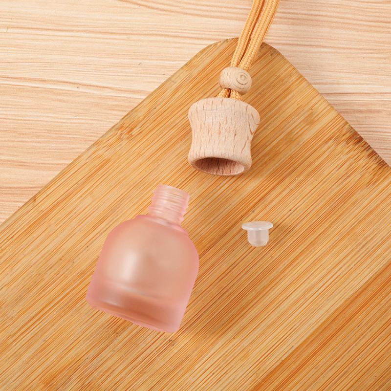 1 Stück nachfüllbare Auto ätherisches Öl Diffusor Flasche 11 ml Leerer Auto Lufterfrischer Anhänger Parfüm Glasflasche mit Holzkappen