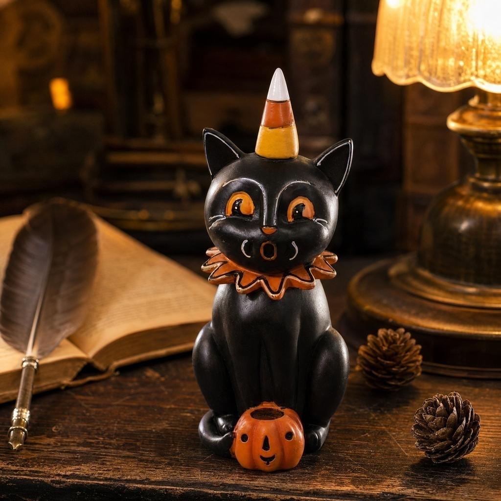 Halloween Cat Figurine Sitting with Pumpkin and Candy Corn Hat Decorative Resin Statue for Seasonal Tabletop Display and Home Decor