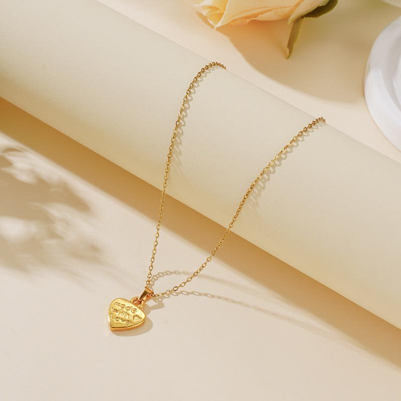 18K Gold Stainless Steel Heart Pendant Necklace - Smooth, Irregular Design, Fashionable and Simple.