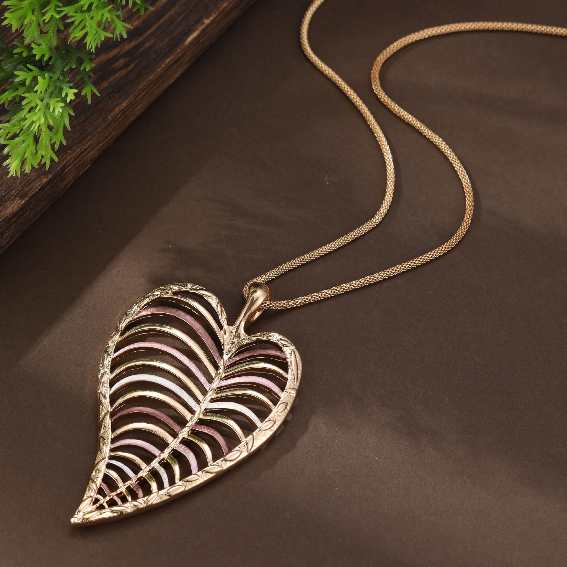 

Новый эмалевый цвет полый геометрический лист длинная подвеска женская преувеличенная неправильной формы лист длинное ожерелье