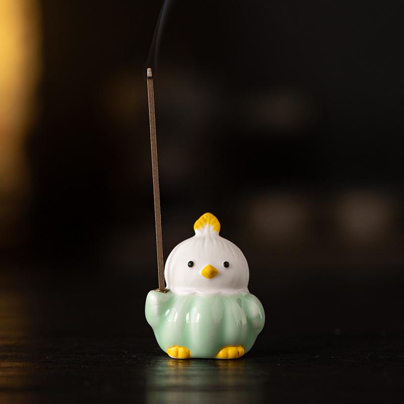 Celadon Rotating Bird Incense Holder – Cute Lotus Leaf Zen Ornament for Home and Tea Table.