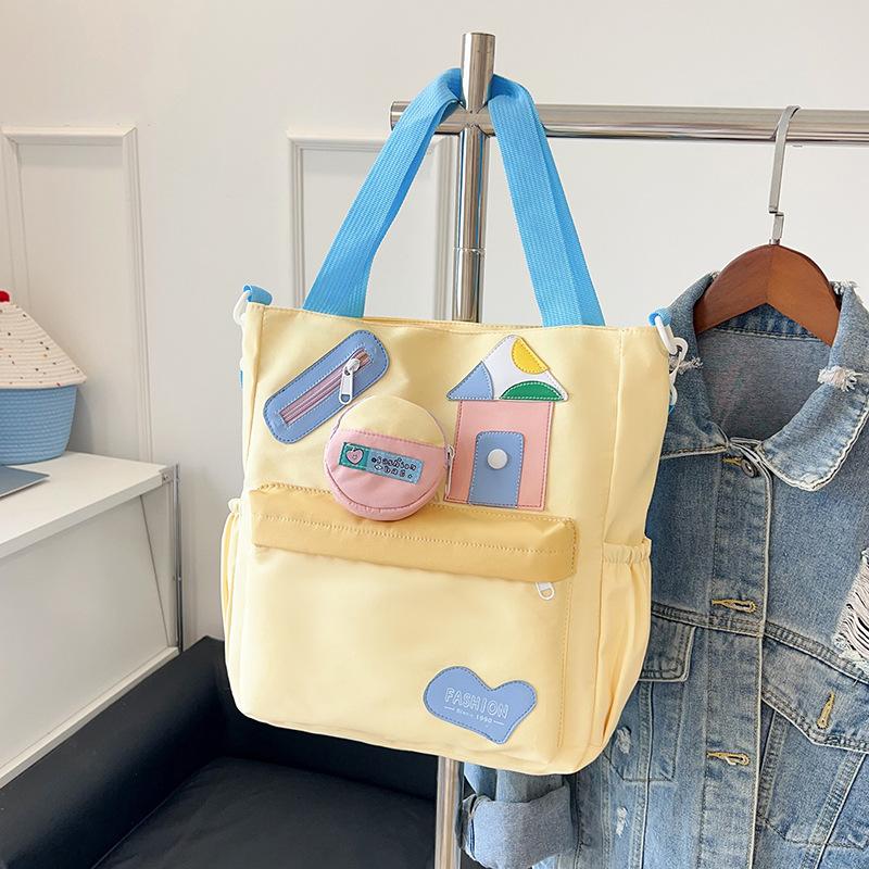 

Новая милая сумка-тоут с мультяшным принтом, повседневная, большой вместимости, контрастного цвета, красивая, портативная, на плечо, сумка-мессенджер, женская жёлтый