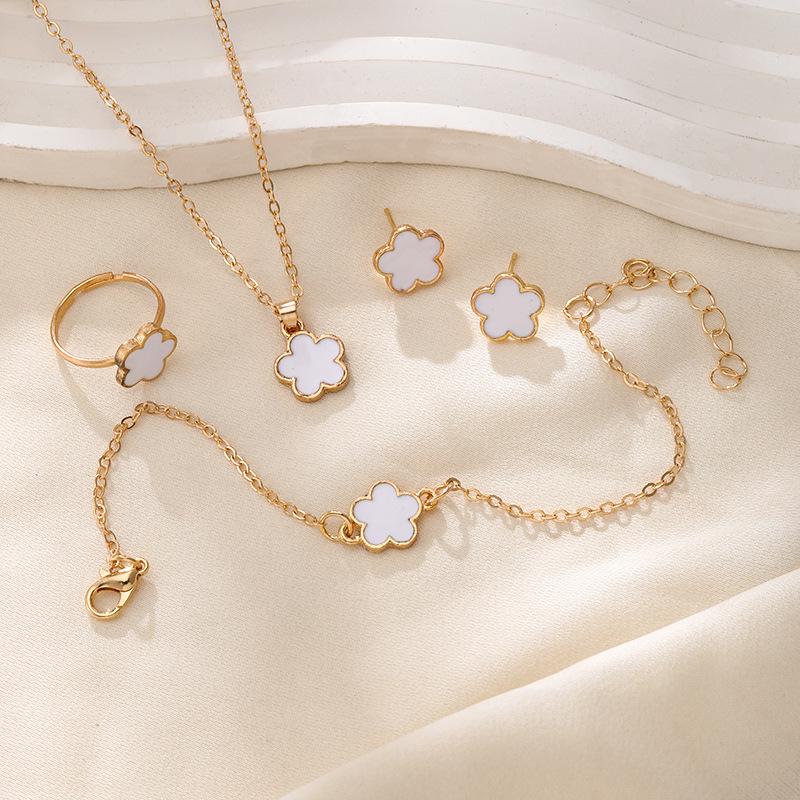 Korean Five-Leaf Clover Jewelry Set: Simple Petal Necklace, Flower Bracelet, Ring, Earrings for Women - 4 Pieces