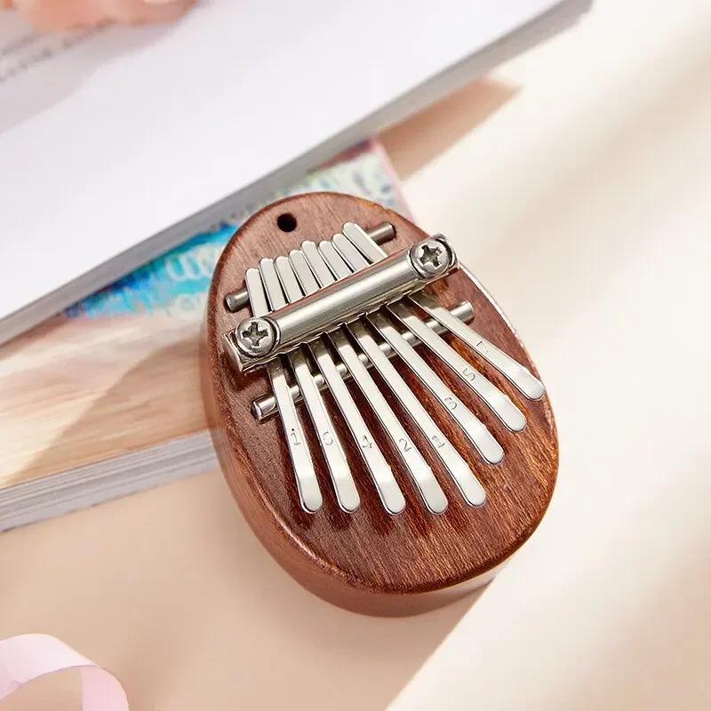 1Pcs Wood Mini Thumb Piano Musical 8 Tones Portable Beginner Finger Piano Kalimba Musical Instruments