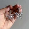 Modern Steel Hollow Heart Shaped Hoop Earrings With Electroplated Finish For Girls