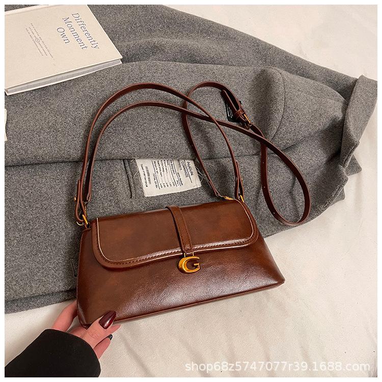 Retro soft leather shoulder armpit bag women's 2025 new versatile fashion handbag casual baguette bag
