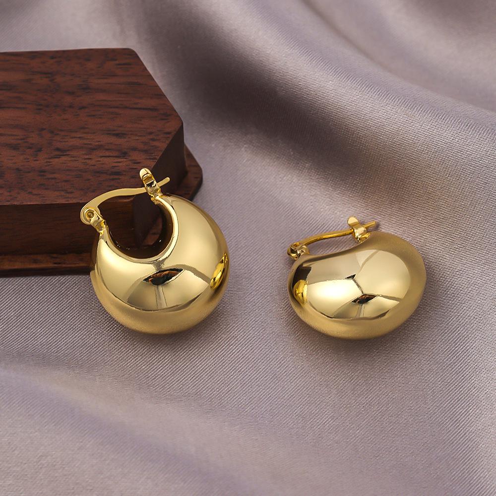 

Европейские и американские серьги-пусеты в виде полукруга из меди с золотым покрытием - Минималистичные роскошные каффы