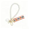 Trending 2025 Keychain Set Fashion Minimalist Pearl Car Keychain Woven Stripe Bag Charm Elegant Women Keychain Organizer Gift