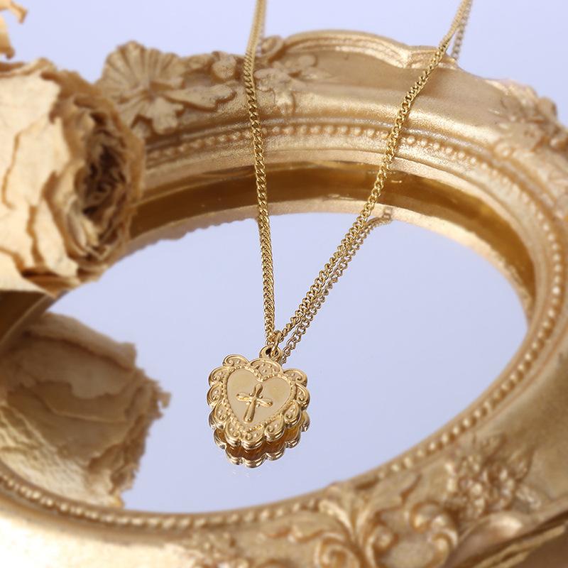 

Французское ожерелье в форме сердца с рельефным крестообразным узором, не выцветает, титановая сталь, покрытая 18-ю настоящим золотом, ювелирные изделия P028