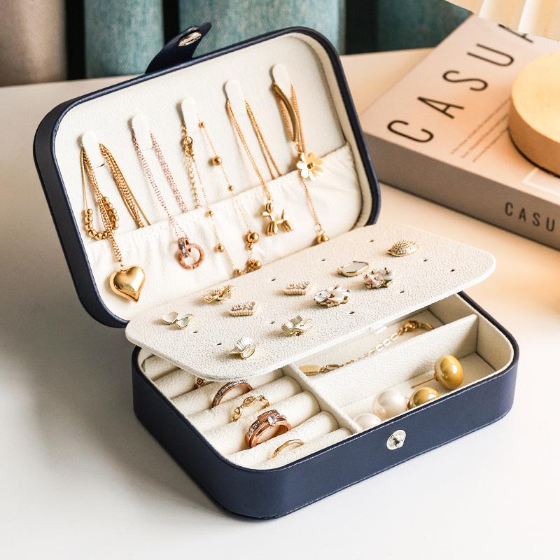 Portable Multifunctional Jewelry Storage Box: Dustproof & Anti-Oxidation for Earrings, Rings, and Bracelets.