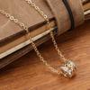 Women Rose Gold Tone Filigree Barrel Pendant Necklace with Sparkling Stone Bands Elegant Bohemian Style Jewelry
