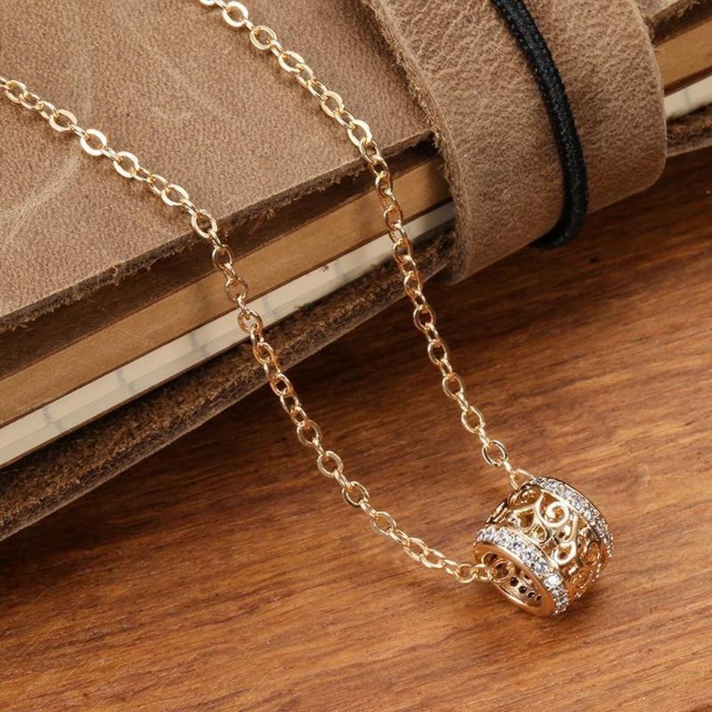 Women Rose Gold Tone Filigree Barrel Pendant Necklace with Sparkling Stone Bands Elegant Bohemian Style Jewelry