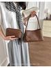 Elegant French Woven Pattern Baguette Women's Shoulder Bag 2026