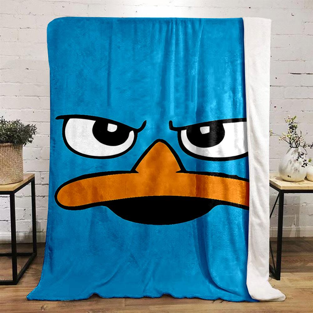 Stylized blue cartoon face with sharp eyes and an orange beak. for all seasons blanket lunch break throw gift