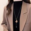 Trojan Horse Pearl Tassel Can Pull Necklace Women's Autumn and Winter Temperament Light Luxury Sweet Niche High-end Sweater Chain