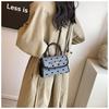 Korean-Style Bow Baguette Shoulder Bag: 2025 Fashionable Textured Women's Crossbody
