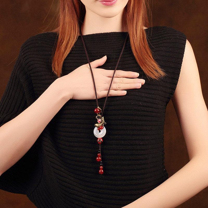 

GEMCHIC Women s Vintage Ethnic Style Long Sweater Necklace with Glass Ping An Buckle Pendant and Red Beads