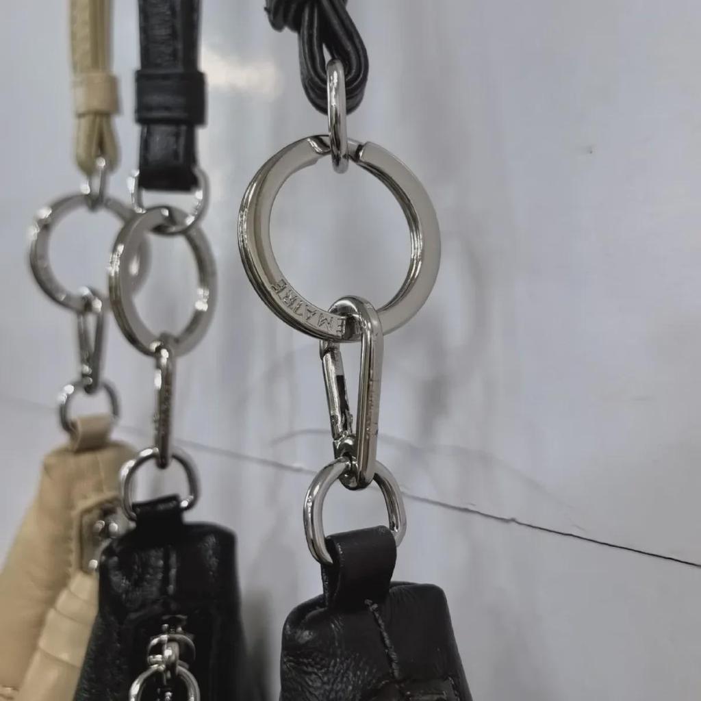 Oryginalna skórzana mini torebka typu croissant w kształcie pieroga - portmonetka i portfel z miejscem na dowód osobisty i klucze