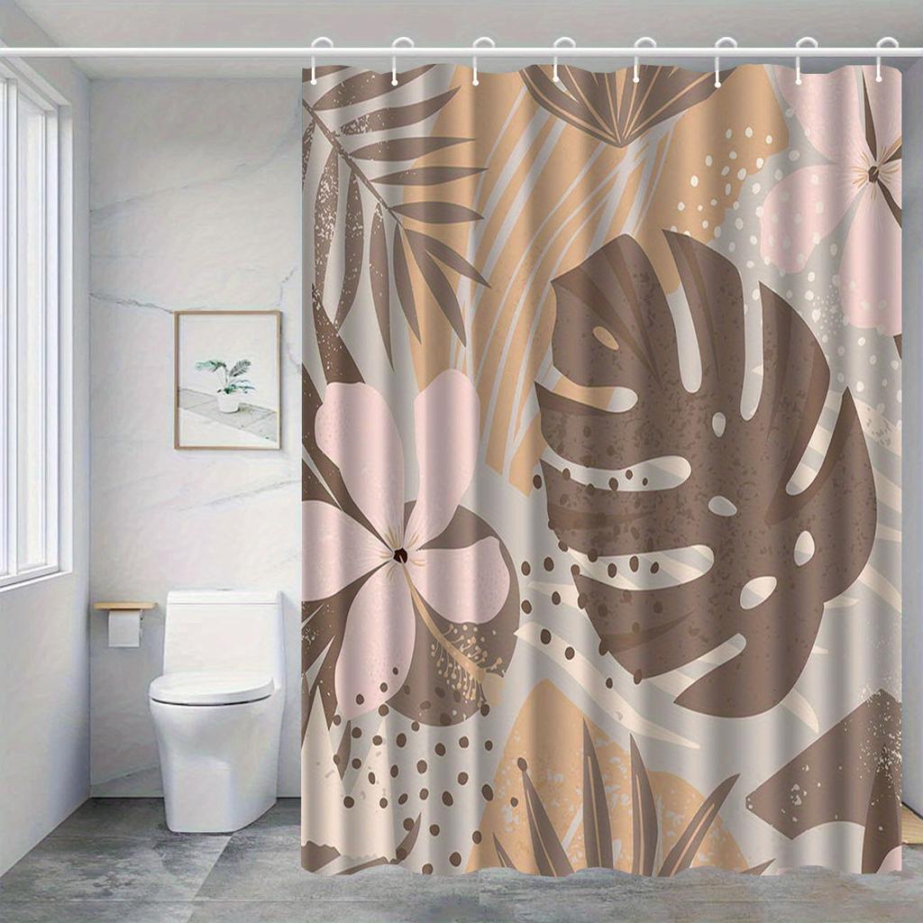 Tropical leaf and floral patterned shower curtain, polyester fabric, machine washable, with hooks, suitable for bathroom décor.