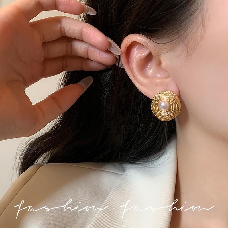 French pearl stud earrings women's medieval earrings gold spiral circle design high-end temperament European and American earrings sterling silver