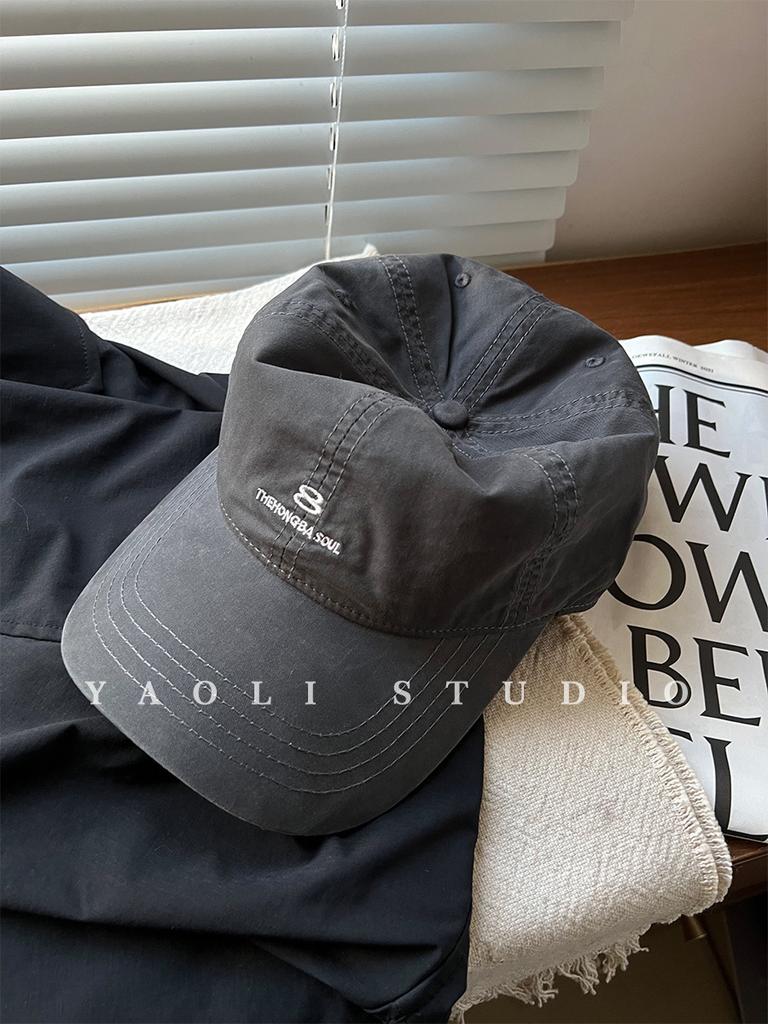 American street style embroidered baseball cap for women, designed for larger head sizes to create a slimming effect. features 