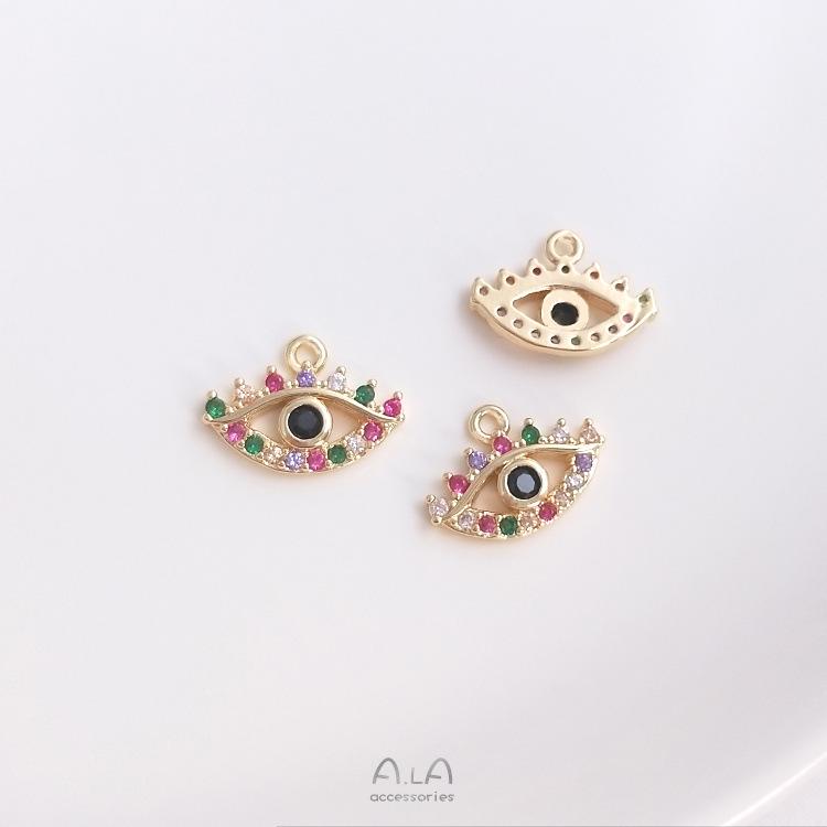 Kolczyki/naszyjnik z zawieszką w kształcie kwiatu z tęczowym okiem, wypełnione 14-karatowym złotem, z kolorowym cyrkoniem.