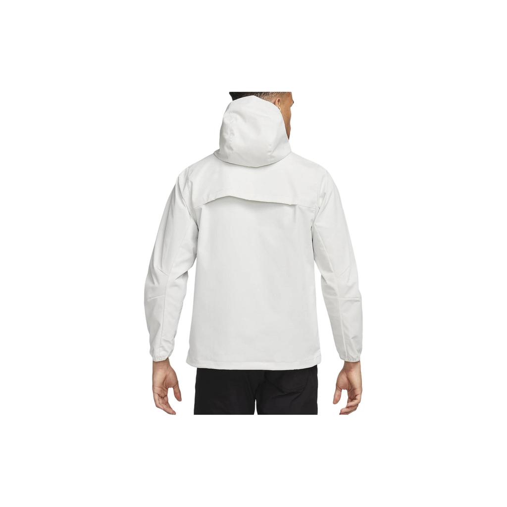 Nike Nieskrępowane Odpychające Wodę Kurtki Anoraki i Płaszcze Golfowe Męskie Jasny Kość FJ6816-072