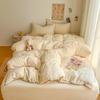 Literie Class A 2025 nouveau vent crème couleur unie drap de lit ensemble quatre pièces housse de couette étudiante ensemble quatre pièces ménage