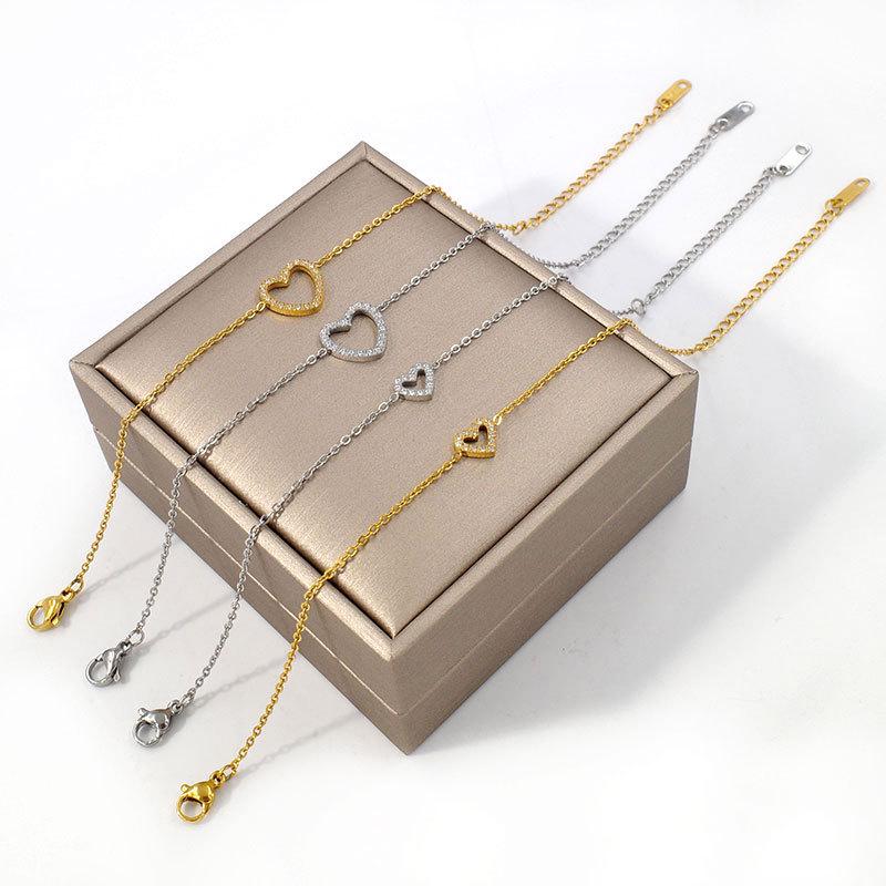 European Diamond-Accented Heart Jewelry Set: Necklace, Bracelet & Earrings in Titanium Steel for Women's Luxurious Style.