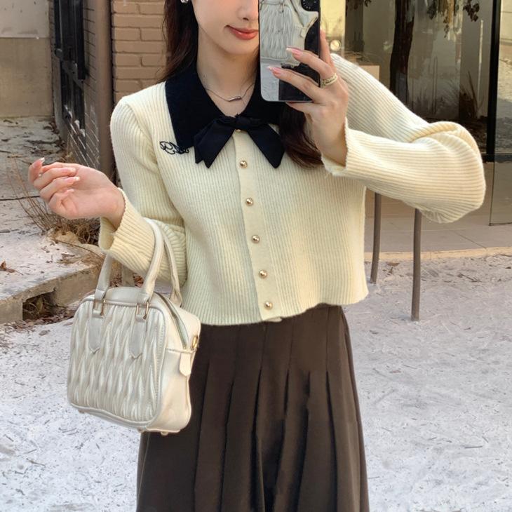 

Sheep wool washing water, Korean autumn bow gray sweater design sense long sleeve knitted cardigan short one size fits all