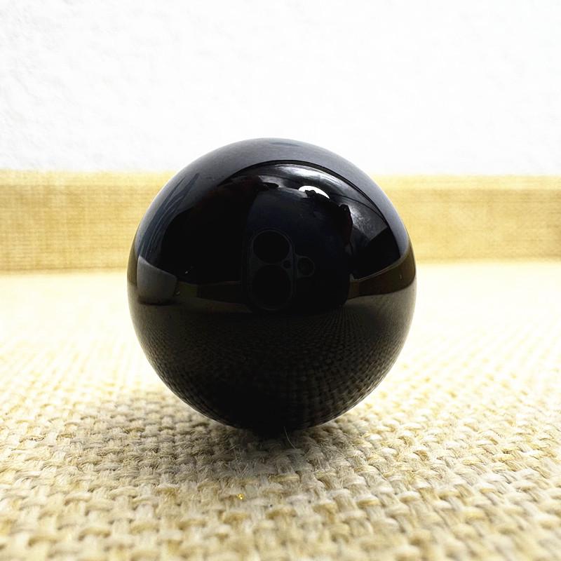 Black Stone Round Glass Ball Sculpture with Inlaid Eyes - No-Hole Design for Display and Decoration