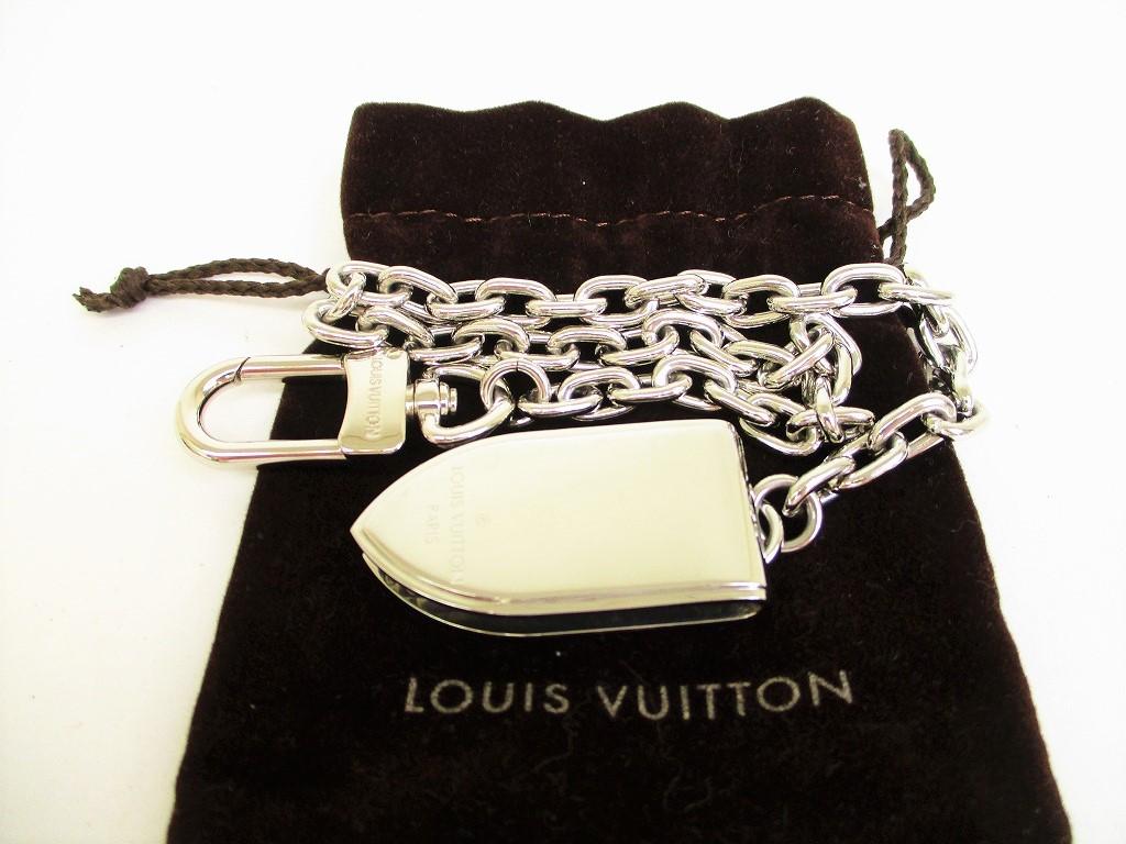 

Автентичний LOUIS VUITTON з нержавіючої сталі на ланцюжку, затискач для купюр, затискач для грошей №9132, б/у