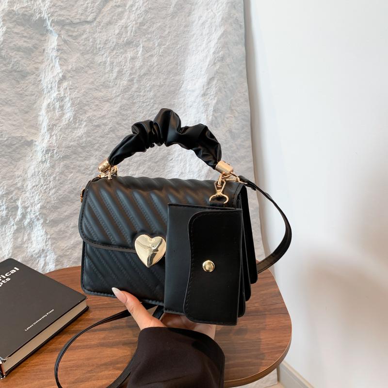 

Textured women s bag hand commuting simple new 2025 messenger bag small square bag fashion casual personality popular shoulder bag