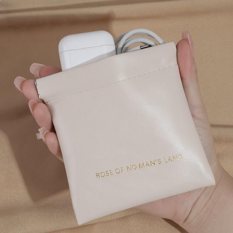 Automatisk stängande förvaringsväska Läppstiftspåse PU-läder Kabelorganisatörsväska Försegling Mynt Nycklar Smycken Förvaringsorganisatörsväska för hörlurar Mini Bärbar