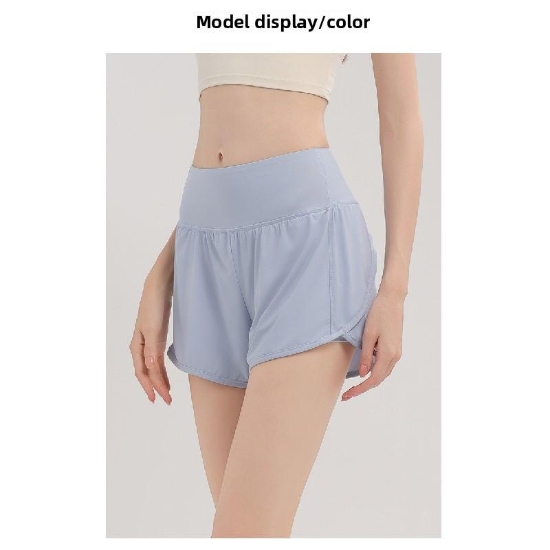 Nude-feel quick-dry sports shorts for women, loose-fitting, anti-exposure, high-waisted, for running, fitness, training, and casual wear in summer