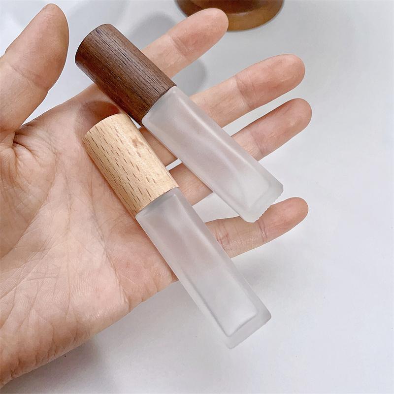 Szklana butelka na perfumy 9 ml z drewnianą nakrętką Puste wielokrotnego napełniania Atomizer do perfum w sprayu Pojemniki