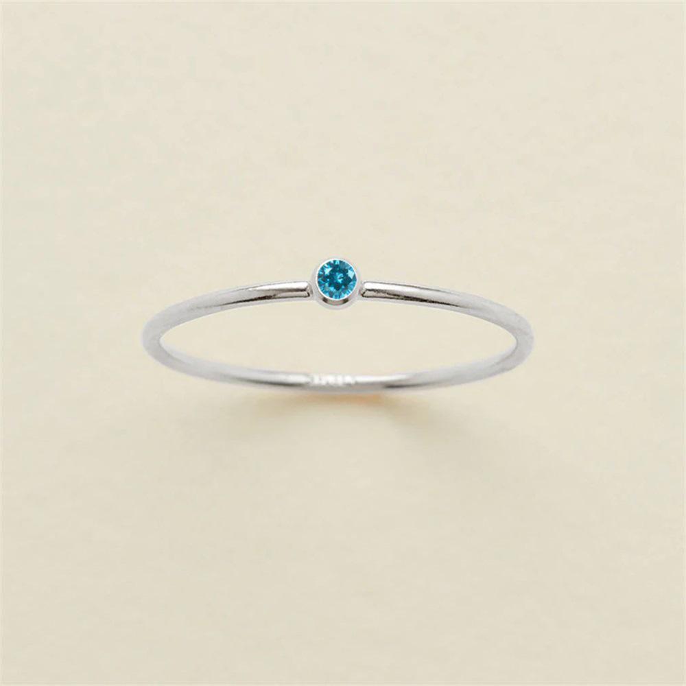 eManco Gold-Plated Non-Constricting Ring for Women - Thin Band with Tiny Diamond Accents and December Birthstone