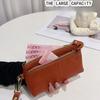 Litchi pattern lady holding wallet