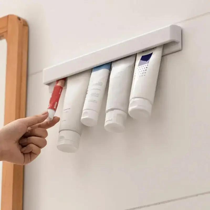 Toothpaste Rack Squeeze Artifact Facial Cleanser Punch-free Home Bathroom Toilet Wall-mounted Clip Storage Toothpaste Clip