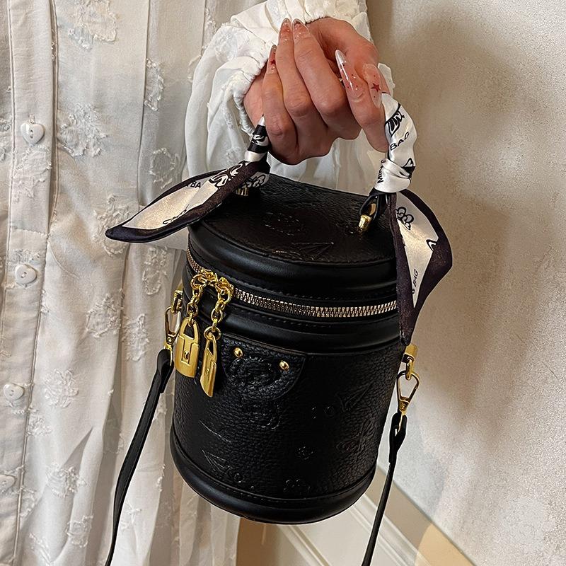 High-quality Cute Embossed Light Luxury High-end Portable Cylinder Bag Niche Design Versatile Temperament Messenger Women's Bag
