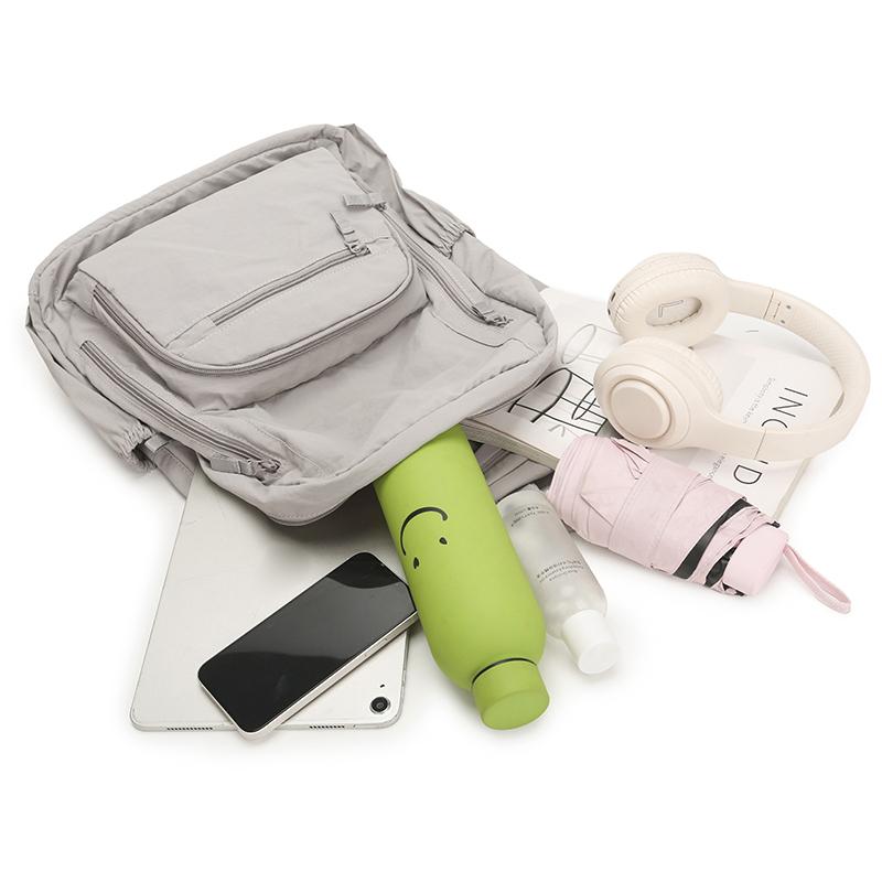 Ryggsäck i enfärgat dam lätt utomhusryggsäck stor kapacitet student skolväska