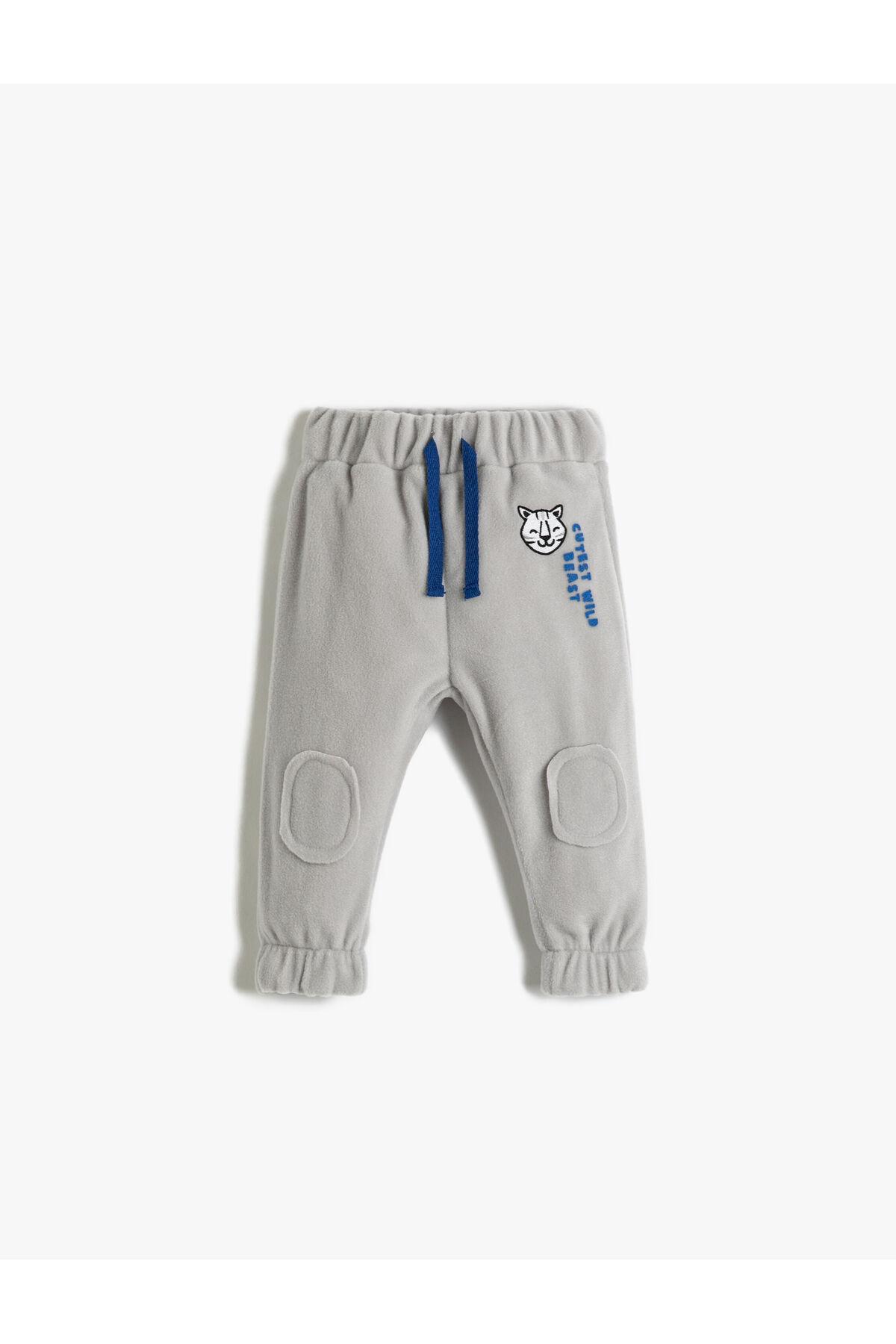 

Спортивные штаны Polar Jogger с завязкой на талии, аппликацией, тигровым принтом...