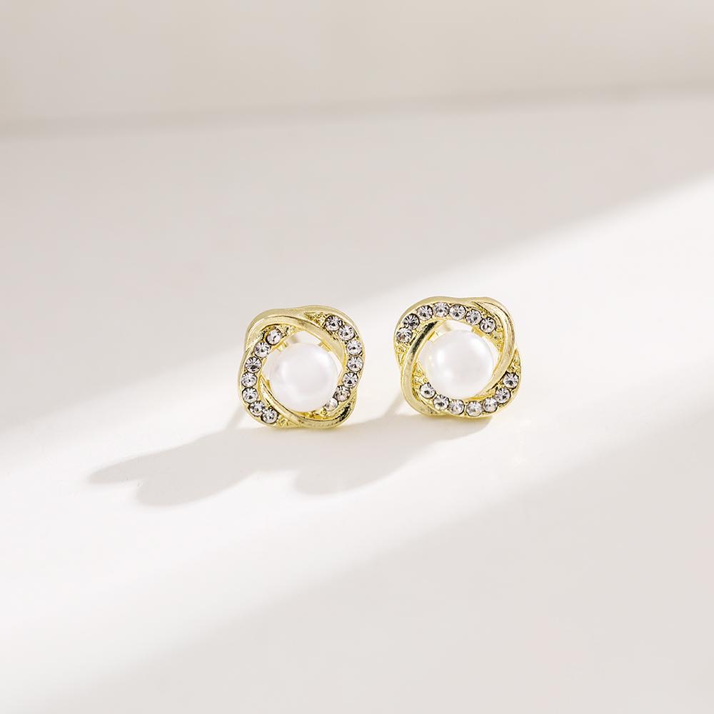 Boucles d'oreilles élégantes de couleur or pour femmes, tempérament blanc, boucles d'oreilles irrégulières, bijoux tendance, cadeaux