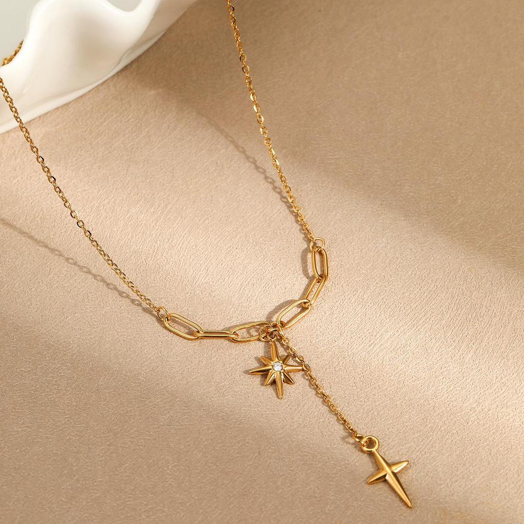 Hot-Selling Eight-Pointed Star Necklace: Gold-Plated Copper Tassel with Diamond-Studded Cross Pendant on Minimalist Clavicle Chain.