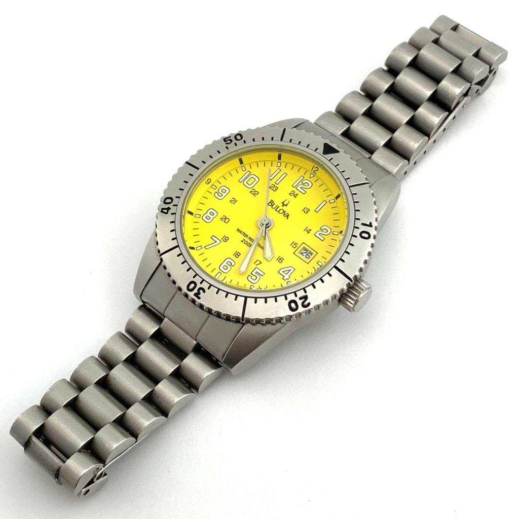 Used [Used] Bulova yellow dial wristwatch 200m waterproof