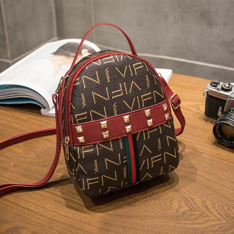 Guangzhou women's bag autumn new product printing fashion rivet bag diagonal span backpack crossbody backpack