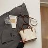 High-end Contrasting Color Portable Bucket Bag Women's New Spring and Summer Fashion Messenger Bag Commuter Small Bag