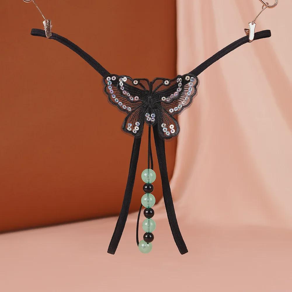 "Luminous Pearl Massage Open-Crotch Thong for Women: Sexy Nightclub Underwear"