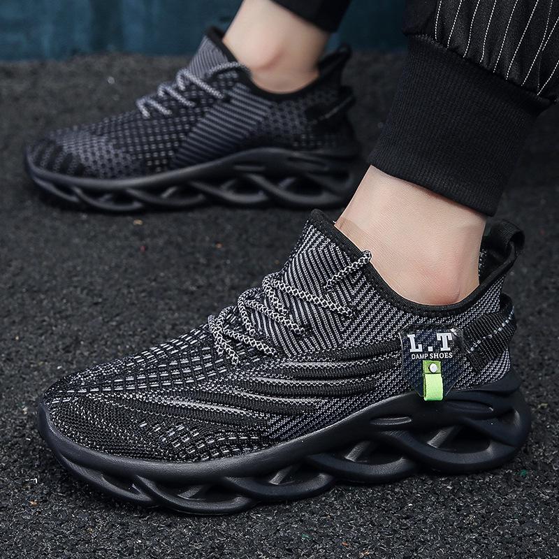 Men's 48 Size Flyknit Breathable Mesh Casual Shoes - Spring/Summer Trendy with Twisted Sole and Shock Absorption.