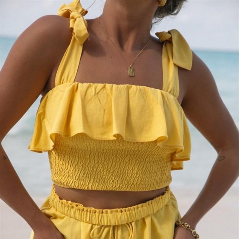 

Летний женский сексуальный однотонный топ с глубоким вырезом и оборками в виде листьев и бантов L жёлтый